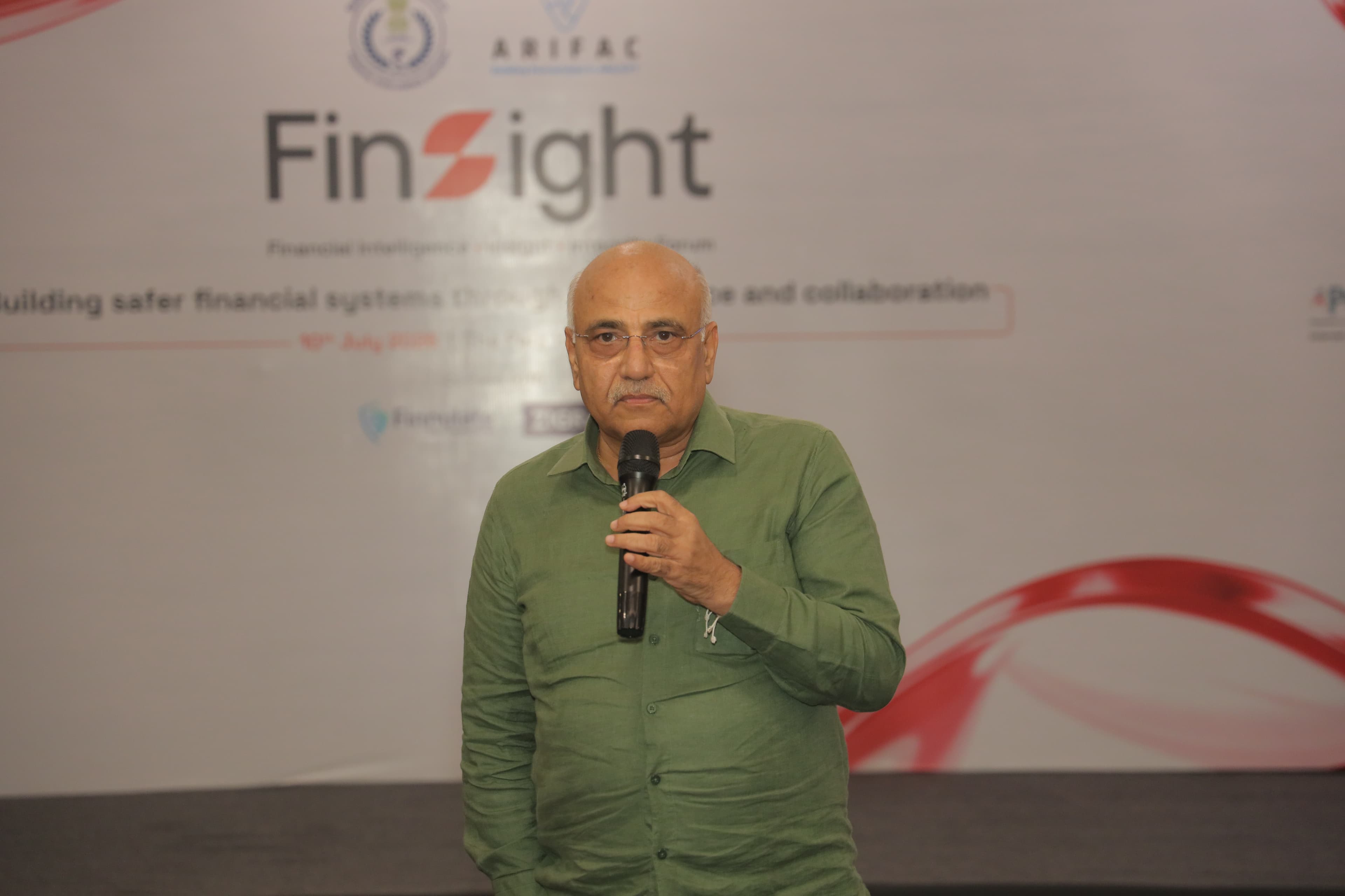 Speaker addressing attendees at FinSight 2026